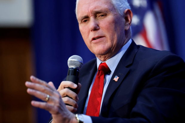 FILE PHOTO: U.S. former Vice President Mike Pence sits for an onstage interview after his remarks on abortion, ahead of Supreme Court arguments in the Dobbs v. Jackson Women's Health Organization case involving a Mississippi abortion law, at the National Press Club in Washington, U.S. November 30, 2021.  REUTERS/Jonathan Ernst/File Photo