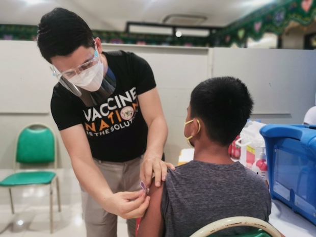 Photo for story: 7,416 kids get COVID-19 vaccination on first day of gov’t drive