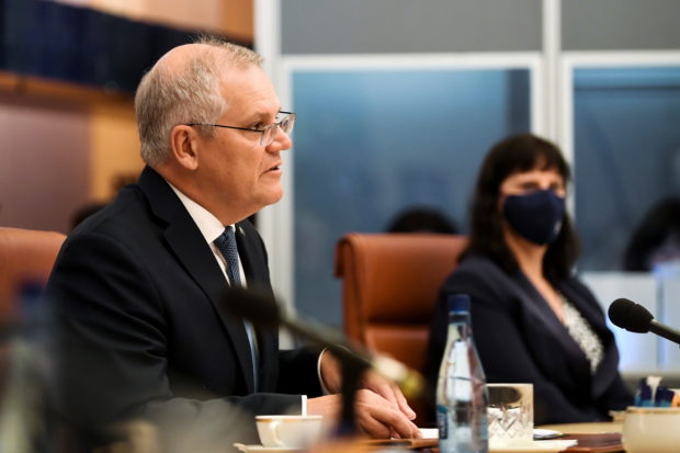 Australian Prime Minister Scott Morrison speaks during a bilateral meeting with South Korean President Moon Jae-in at Parliament House, in Canberra, Australia December 13, 2021. Lukas Coch/Pool via REUTERS