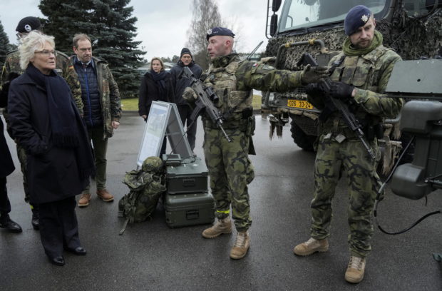 FILE PHOTO: German Defence Minister Christine Lambrecht meets soldiers as she visits Rukla military base, Lithuania December 19, 2021. REUTERS/Ints Kalnins