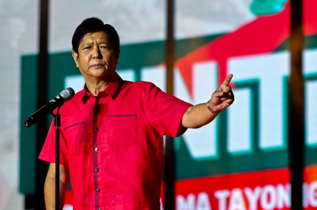 Philippine presidential candidate Ferdinand Marcos Jr., son of late dictator Ferdinand Marcos, gestures as he delivers his speech during the first day of campaign period for the 2022 presidential election, at the Philippine Arena, in Bulacan province, Philippines, February 8, 2022. REUTERS/Lisa Marie David