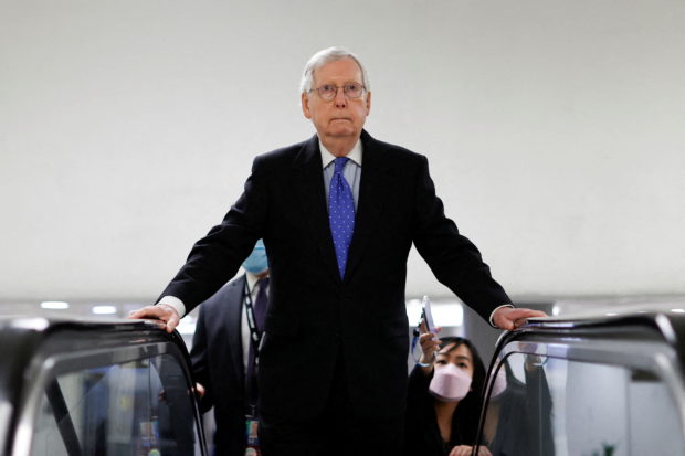 FILE PHOTO: U.S. Senate Minority Leader Mitch McConnell (R-KY) arrives at the U.S. Capitol after a Senate Republican caucus luncheon in Washington, U.S. January 12, 2022. REUTERS/Jonathan Ernst/File Photo