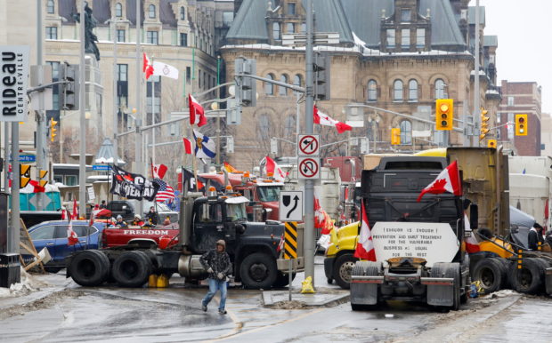 Trucks block downtown streets as truckers and their supporters continue to protest against the coronavirus disease (COVID-19) vaccine mandates, in Ottawa, Ontario, Canada, February 10, 2022. REUTERS/Patrick Doyle