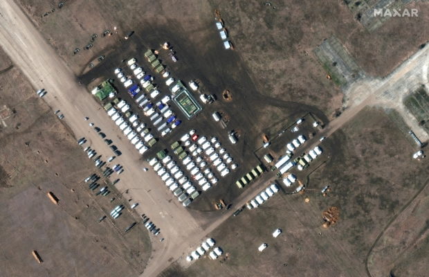 A satellite image shows a close-up of troops and equipment at Oktyabrskoye air base, Crimea February 10, 2022. 2022 Maxar Technologies/Handout via REUTERS