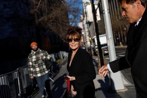 Sarah Palin, 2008 Republican vice presidential candidate and former Alaska governor, arrives with former NHL hockey player Ron Duguay during her defamation lawsuit against the New York Times, at the United States Courthouse in the Manhattan borough of New York City, U.S., February 11, 2022.  REUTERS/Shannon Stapleton