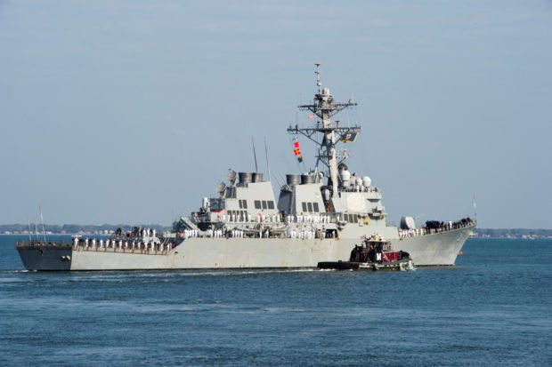 FILE PHOTO: The guided-missile destroyer USS Arleigh Burke gets underway as part of the Harry S. Truman Carrier Strike Group deployment towards the Middle East, from Naval Station Norfolk, Virginia, U.S. April 11, 2018. U.S. Navy/Mass Communication Specialist 2nd Class Justin Yarborough/Handout via REUTERS. ATTENTION EDITORS - THIS IMAGE WAS PROVIDED BY A THIRD PARTY/File Photo