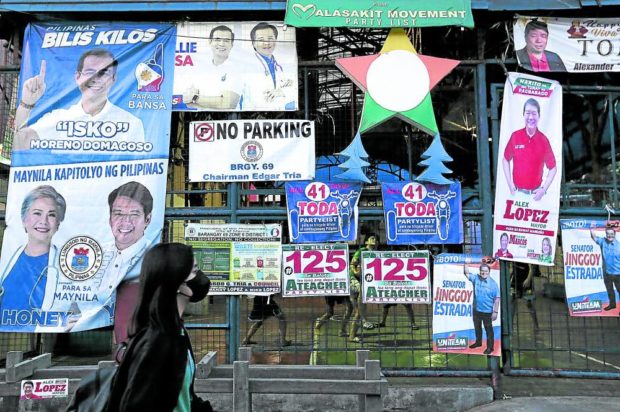 Election campaign posters, for story: PNP wants Comelec to clarify cops’ election duties