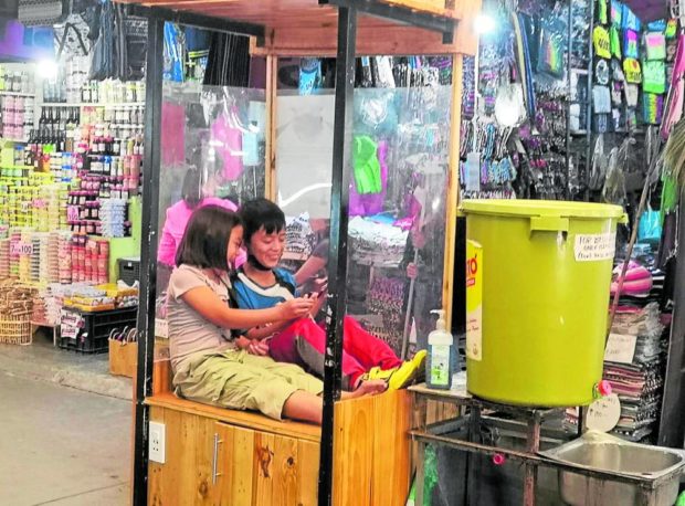 Children at play in Baguio City public market, for stoy, Baguio mulls daily tourist cap of 20,000