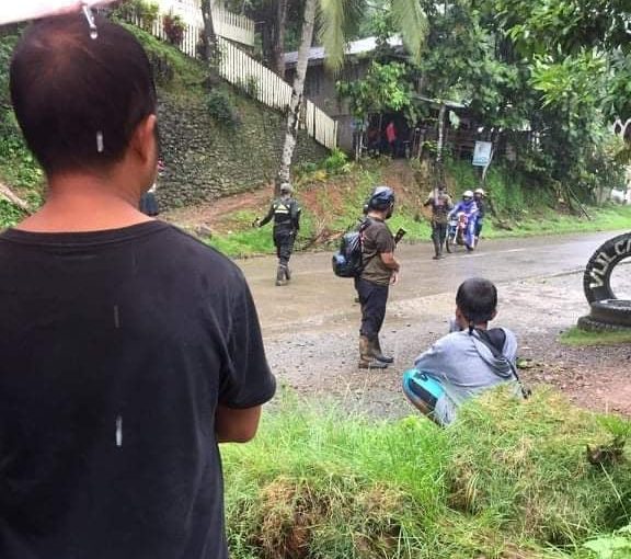 Some 100 New People's Army rebels briefly set up a checkpoint along the national highway of Cortes town in Surigao del Sur around 8 a.m. Thursday, disrupting travel by motorists, even as they reportedly ransacked the sari-sari store and house of a former Army officer nearby.