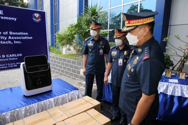 The Philippine National Police receives oxygen equipment from the Great Heart Charity Association during a turnover ceremony in Camp Crame, Quezon City.