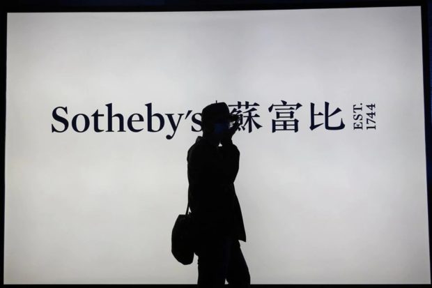 Sotheby’s sign in Hong Kong, for story: Largest blue diamond up for auction