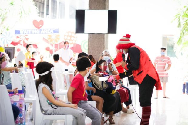 Young children were treated to clowns and mascots during a pediatric vaccination at the Philippine Children's Medical Center. Image courtesy of PCMC