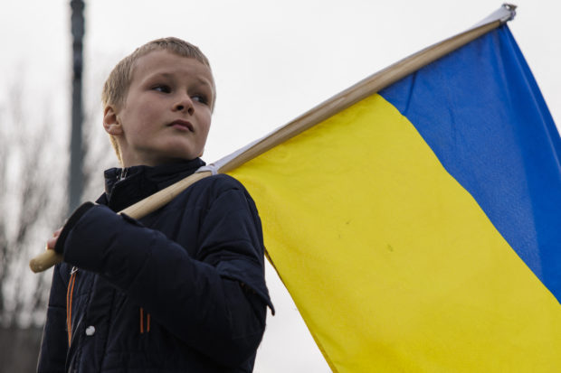 boy with ukraine flag