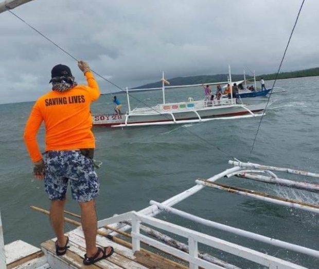 A Coast Guard officer on duty at a port in Bohol.