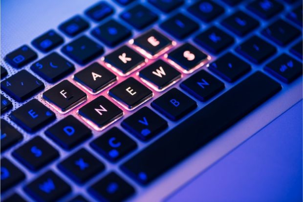 Stock photo of keyboard with FAKE NEWS lighted, for story: 70% of Pinoys say fake news a serious problem – SWS