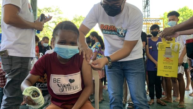 A resident of San Marcelino town in Zambales gets inoculated against COVID-19 during a recent mass vaccination drive