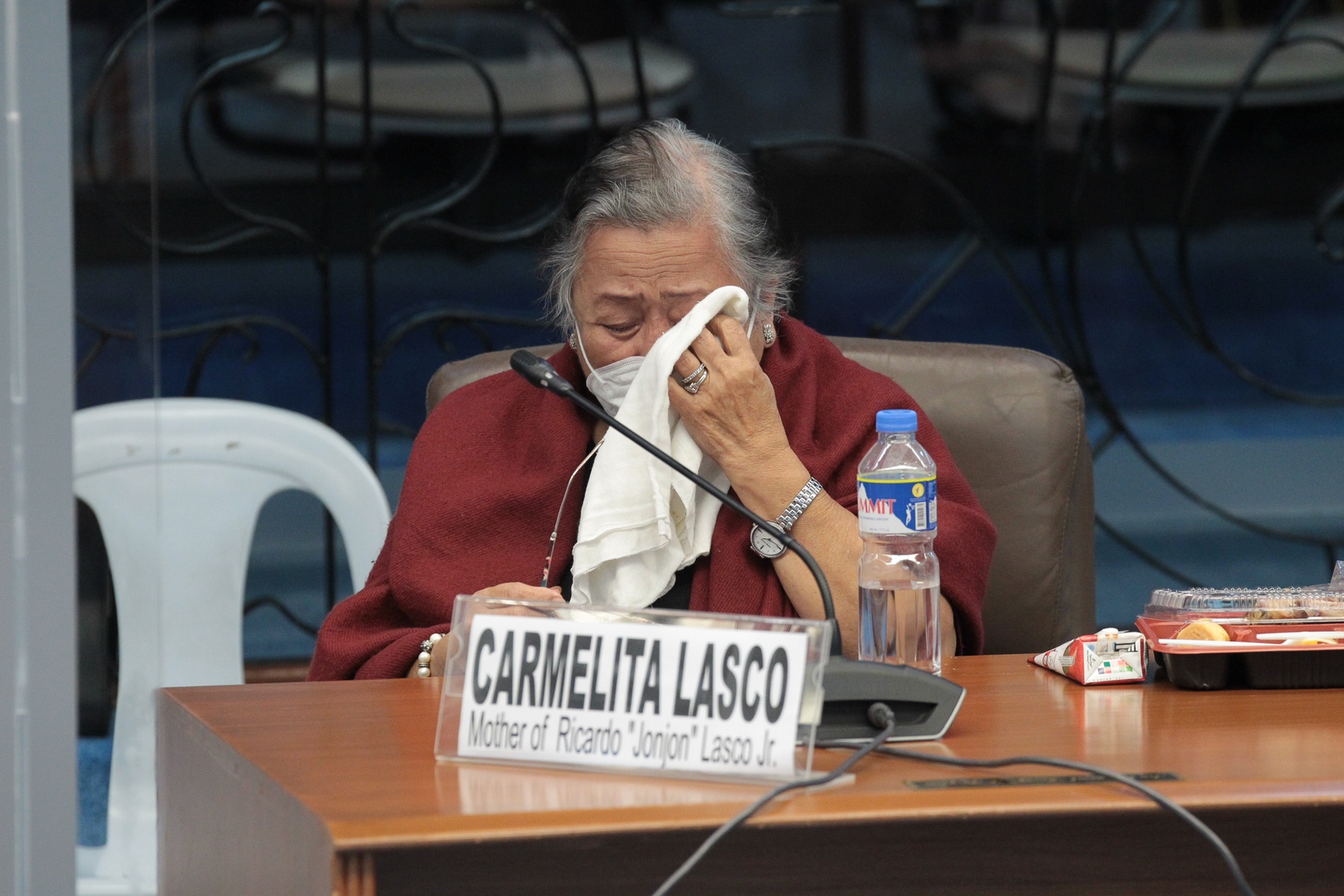 Carmelita Lasco, the mother of Ricardo Lasco who is among the 34 missing individuals involved in cockfighting, physically attends the Senate public order committee inquiry on Monday, Mar. 21, 2022. (Voltaire F. Domingo/Senate PRIB) e-sabong agent missing police