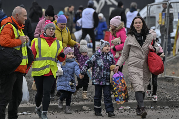 Poland opens doors as refugee count hits a million
