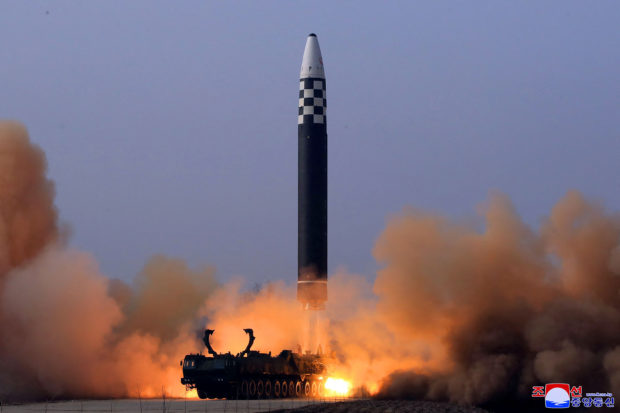 This picture taken on March 24, 2022 and released from North Korea's official Korean Central News Agency (KCNA) on March 25, 2022 shows the test launch of a new type inter-continental ballistic missile (ICBM) Hwasongpho-17 of North Korea's strategic forces in an undisclosed location in North Korea. (Photo by KCNA VIA KNS / AFP) / South Korea OUT / ---EDITORS NOTE--- RESTRICTED TO EDITORIAL USE - MANDATORY CREDIT "AFP PHOTO/KCNA VIA KNS" - NO MARKETING NO ADVERTISING CAMPAIGNS - DISTRIBUTED AS A SERVICE TO CLIENTS / THIS PICTURE WAS MADE AVAILABLE BY A THIRD PARTY. AFP CAN NOT INDEPENDENTLY VERIFY THE AUTHENTICITY, LOCATION, DATE AND CONTENT OF THIS IMAGE --- /