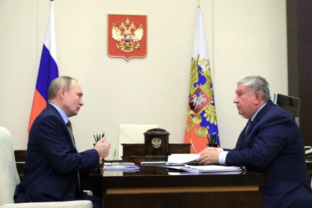 Russian President Vladimir Putin meets with Chief Executive of oil producer Rosneft Igor Sechin at the Novo-Ogaryovo state residence outside Moscow on February 15, 2021. (Photo by Mikhail KLIMENTYEV / SPUTNIK / AFP)