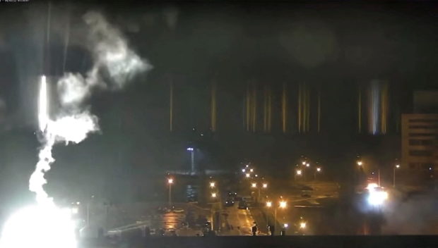 Surveillance camera footage shows a flare landing at the Zaporizhzhia nuclear power plant during shelling in Enerhodar, Zaporizhia Oblast, Ukraine March 4, 2022, in this screengrab from a video obtained from social media. Zaporizhzhya NPP via YouTube/via REUTERS