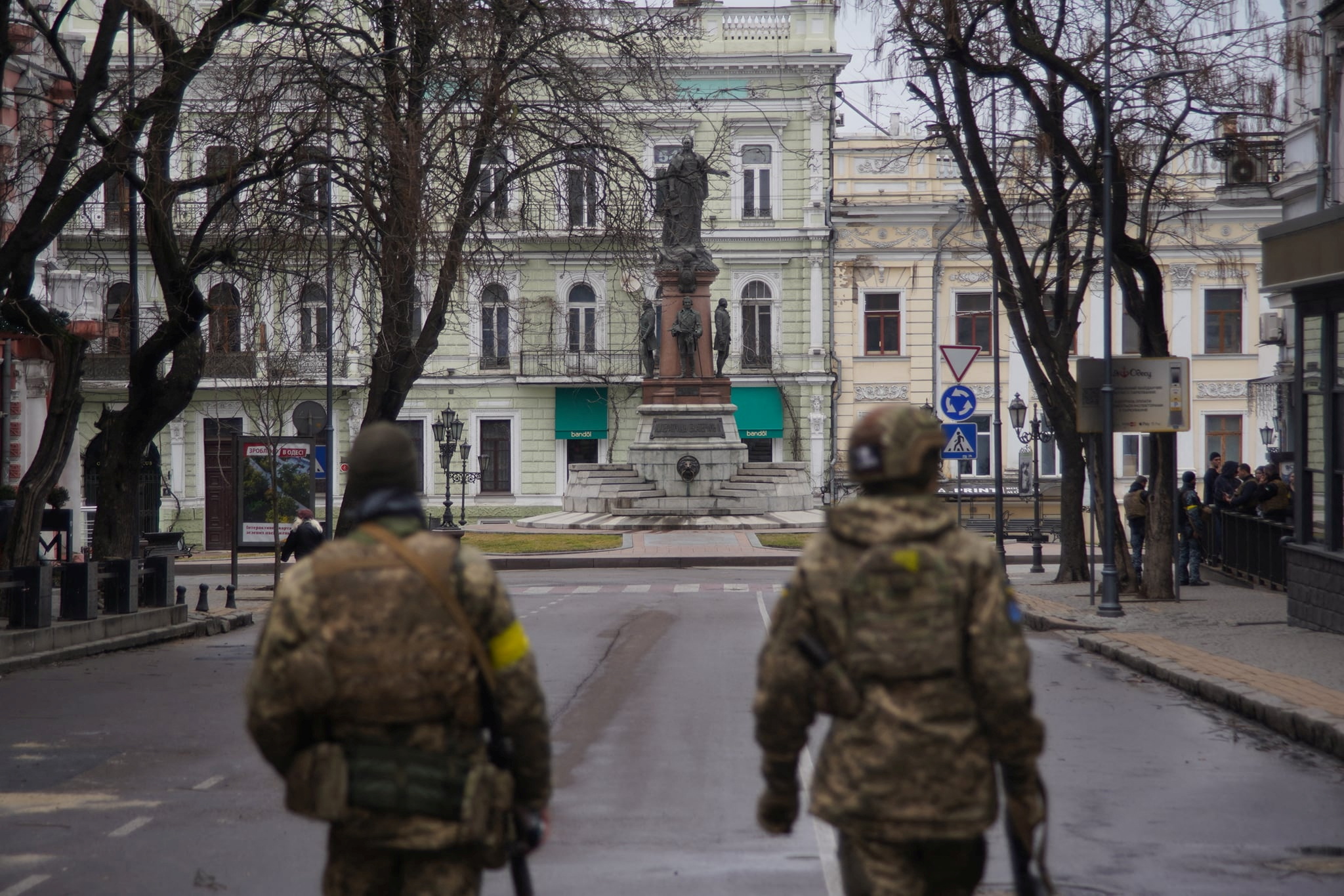 Members of Ukraine's Territorial Defence Forces patrol a street, amid the Russian invasion of Ukraine, in Odessa, Ukraine, in this handout picture released March 4, 2022. Press service of the 28th Separate Mechanised Brigade/Handout via REUTERS civilian death toll ukraine russia invasion