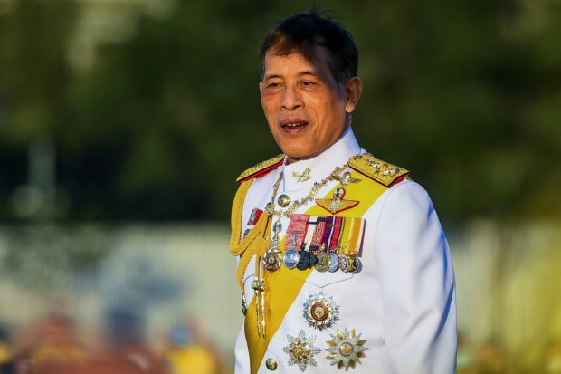 Thai man jailed for insulting monarchy with sticker on king's portrait