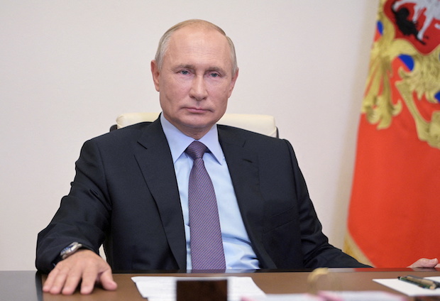 Russian President Vladimir Putin, FOR STORY: Putin says Western sanctions are akin to declaration of war