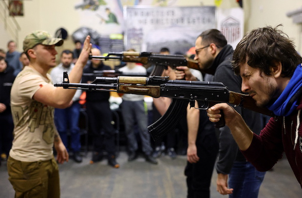 Men in Ukraine traine for territorial defense in Lviv.