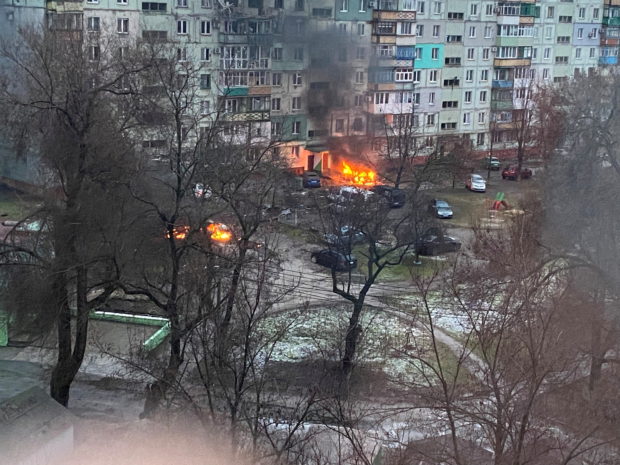 FILE PHOTO: Fire is seen in Mariupol at a residential area after shelling amid Russia's invasion of Ukraine March 3, 2022, in this image obtained from social media. Twitter @AyBurlachenko via REUTERS