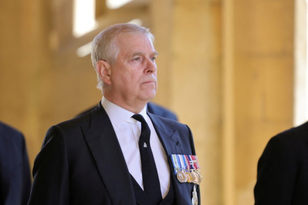FILE PHOTO: Britain's Britain's Prince Andrew, Duke of York, looks on during the funeral of Britain's Prince Philip, husband of Queen Elizabeth, who died at the age of 99, in Windsor, Britain, April 17, 2021. Chris Jackson/Pool via REUTERS/File Photo