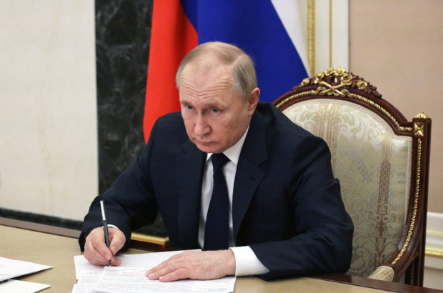 Russian President Vladimir Putin attends a meeting with government members via a video link in Moscow, Russia March 10, 2022. Sputnik/Mikhail Klimentyev/Kremlin via REUTERS