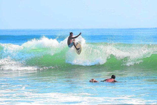 Local surfers ride the waves of Baler, Aurora