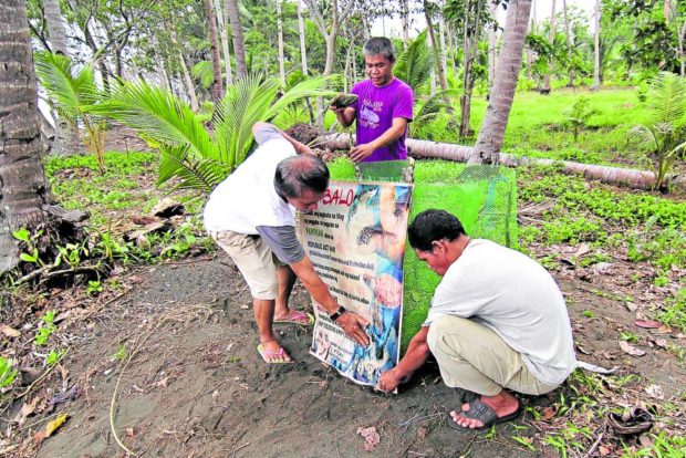 Volunteer community-based conservationists in Barangay Candiis, Magsaysay town