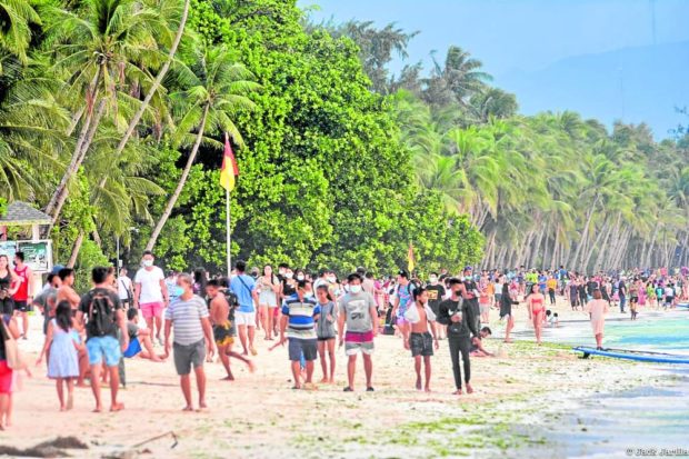 Tourists on Boracay Island. STORY: Boracay tourist arrivals hitting prepandemic mark