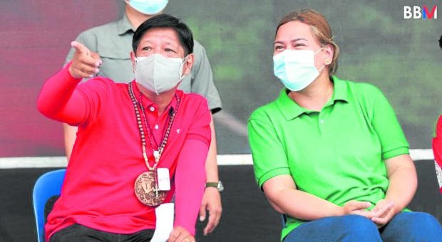 Ferdinand Marcos Jr.and Sara Duterte at a campaign sortie in Laguna on March 12, 2022. .