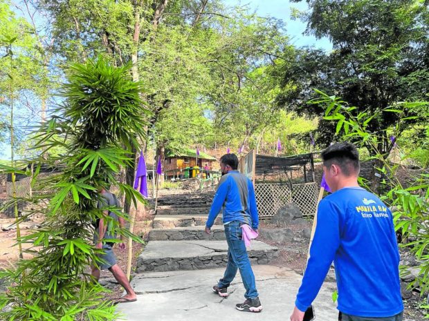 These two foresters are among 12 personnel taking care of the bamboo nursery inside Mt. Arayat National Park in Pampanga, in this photo taken on March 21. STORY: Nursery for Manila Bay bamboo parks rises on Pampanga’s Mt. Arayat