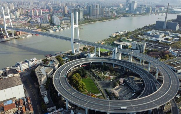 An aerial view shows a bridge over the Huangpu river, Shanghai
