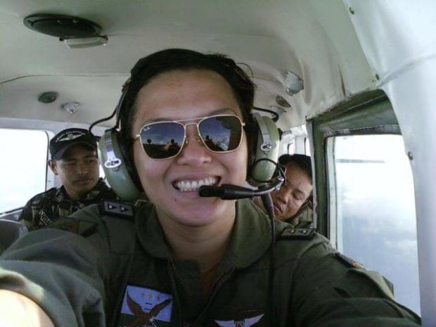 Major Zeerah Blanche Lucrecia smiling inside a plane.