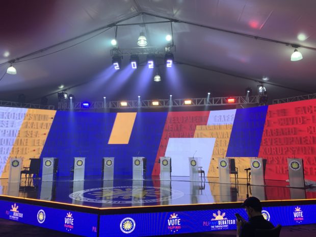 Comelec presidential debates podium. STORY: Presidential bets see widespread poverty while touring PH