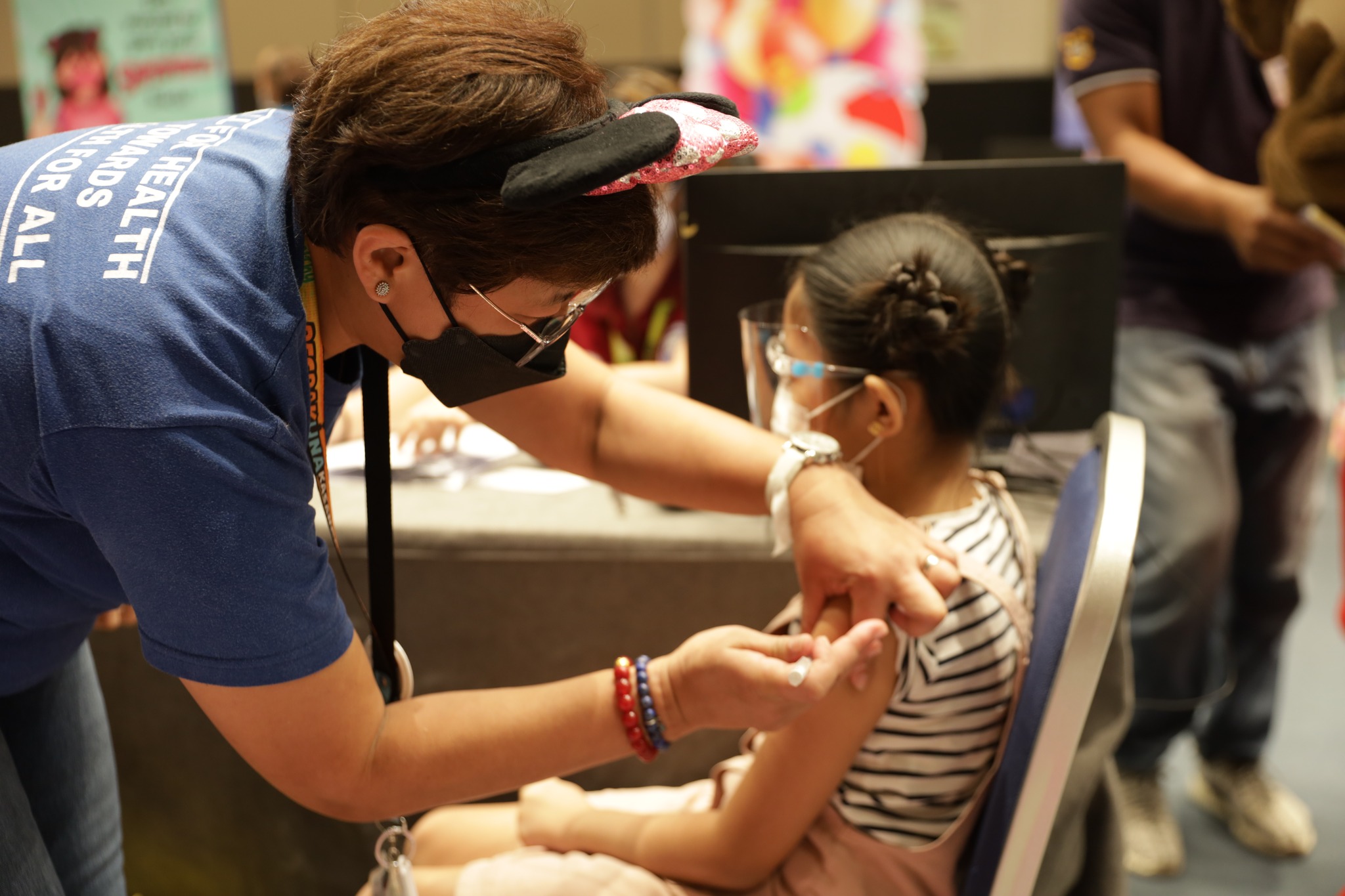 A healthcare worker administers a Pfizer COVID-19 vaccine shot during a recent pediatric vaccination in Olongapo City. 