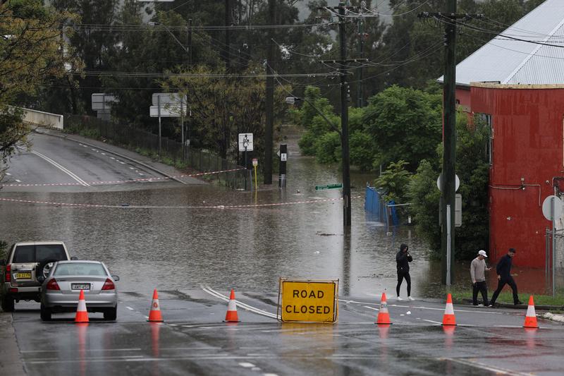 Relentless rains submerge Australian towns for second time in a month