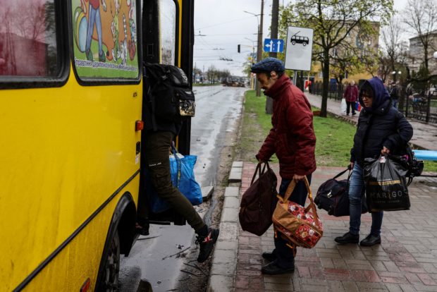 Ukraine says 4 buses carrying evacuees have left Mariupol