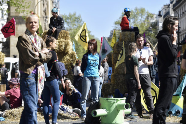 Climate activists disrupt traffic in London, Paris