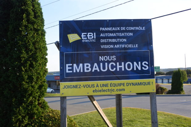 In this file photo taken on September 24, 2018 "Hiring" signs are seen outside most businesses in the city of Saint-Georges, about 300 kilometres (185 miles) northeast of Montreal. - A record number of baby boomers that are set to retire from the labor force threatens to compound a worker shortage in Canada, according to data from a 2021 census released April 27, 2022. (Photo by Clément SABOURIN / AFP)