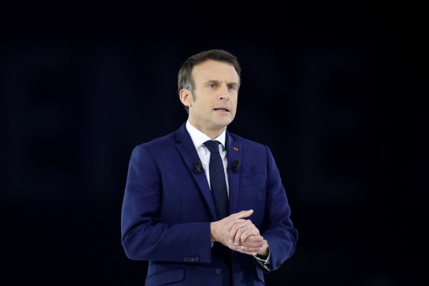 FILE PHOTO: French President Emmanuel Macron, candidate for his re-election in the 2022 French presidential election, attends a political campaign rally at Paris La Defense Arena in Nanterre, France, April 2, 2022. REUTERS/Sarah Meyssonnier
