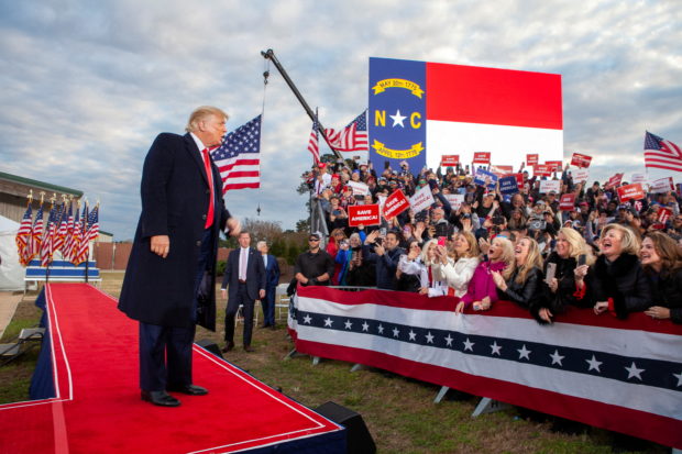 FILE PHOTO: Former U.S. President Donald Trump greets the crowd during a rally he hosted in Selma, North Carolina, U.S., April 9, 2022. REUTERS/Erin Siegal McIntyre/File Photo