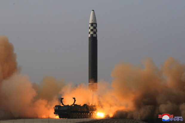 FILE PHOTO: General view during the test firing of what state media report is a North Korean "new type" of intercontinental ballistic missile (ICBM) in this undated photo released on March 24, 2022 by North Korea's Korean Central News Agency (KCNA). KCNA via REUTERS