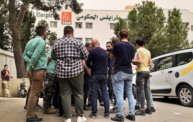 Relatives of people who died when a boat capsized off the Lebanese coast of Tripoli overnight, gather outisde a governmental hospital in Tripoli. STORY: Six dead in Tripoli boat capsizing, Lebanon minister says