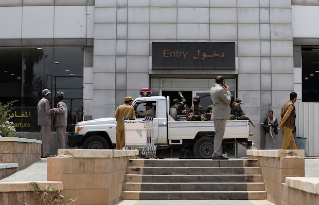Houthi security patrol the vicinity of Sanaa airport in Sanaa. STORY: Oman secures release of 14 foreigners held in Yemen